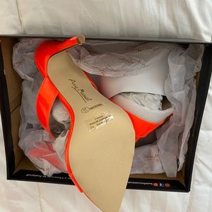 Neon orange high heels